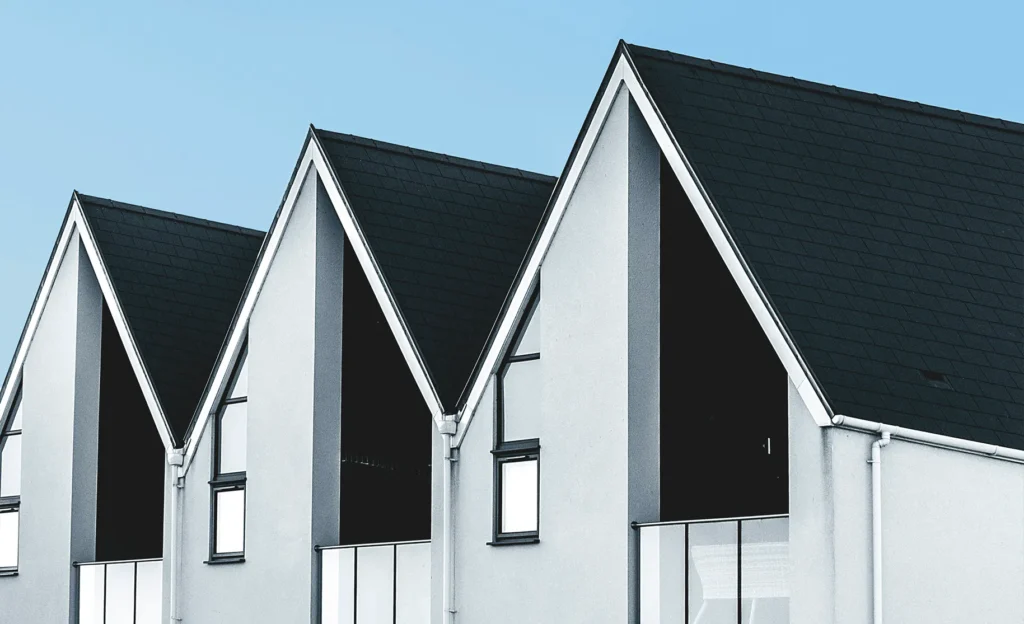 White houses with black tiled roofing